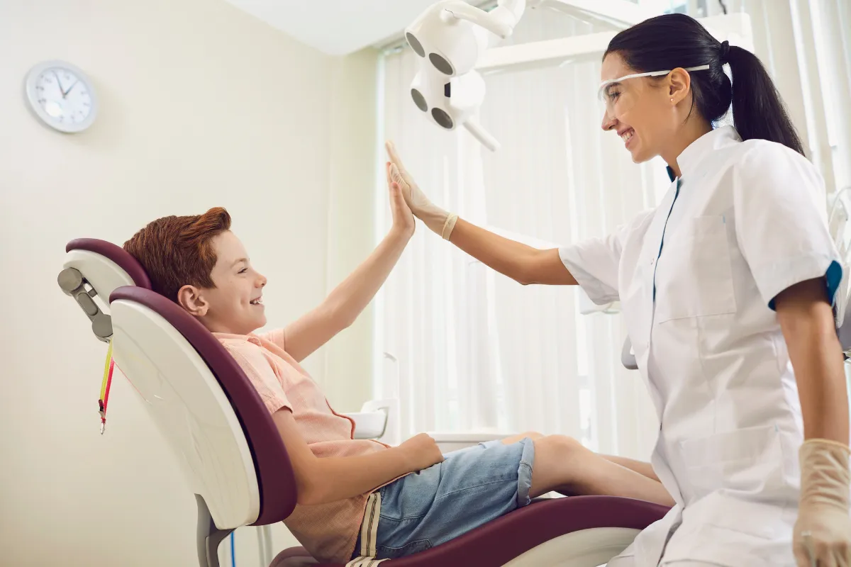 Child smiling after a dental visit